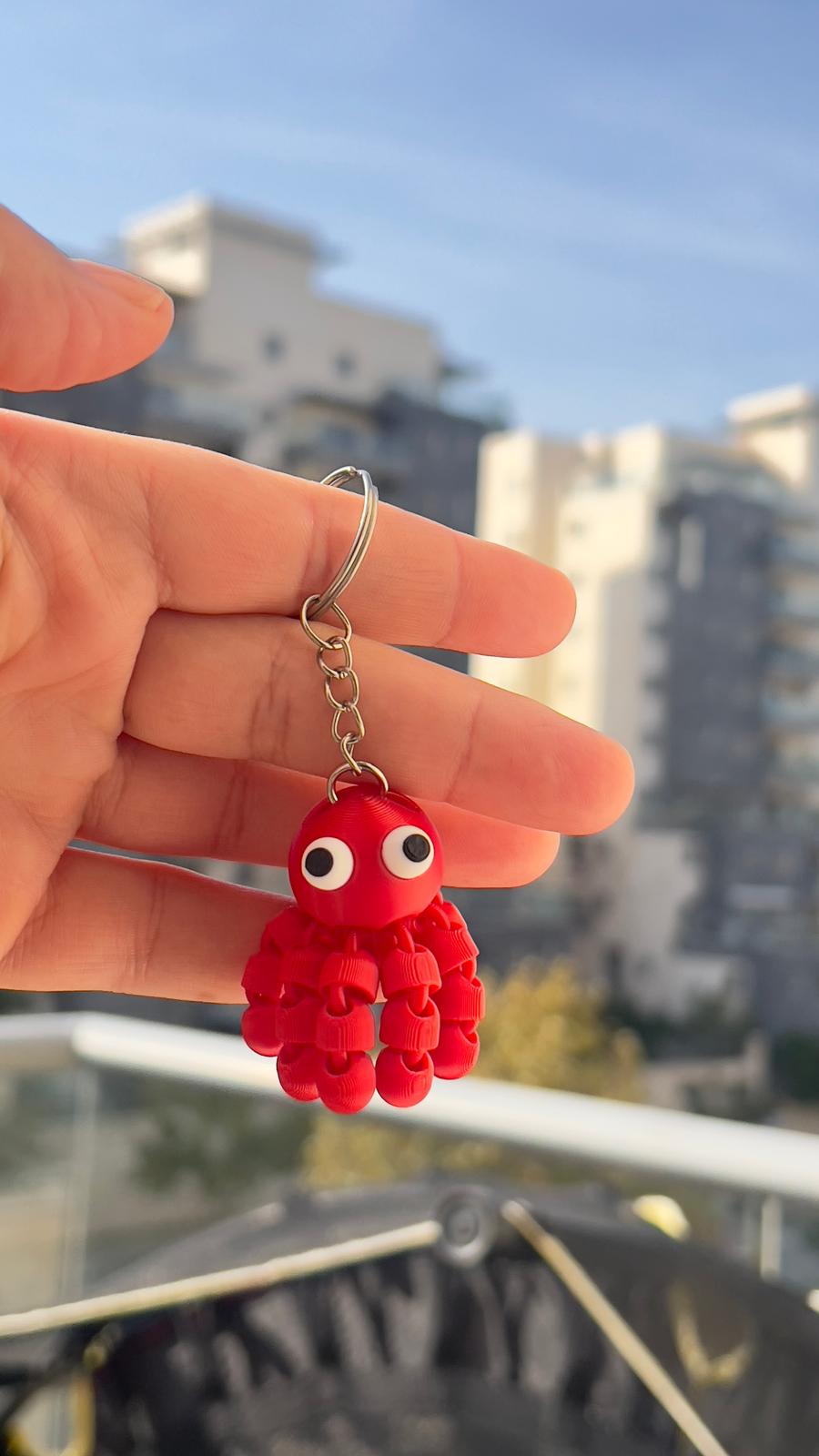 מחזיק מפתחות תמנון מפרקי – צעצוע פידג'ט גמיש ומפיג מתחים